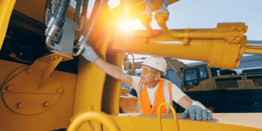 An operator checking the equipment using an excavator inspection checklist