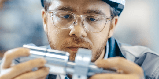 an inspector performing first article inspection
