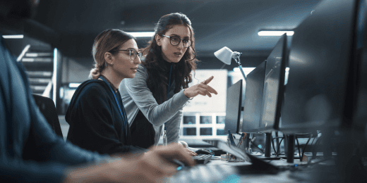 Two IT officers ensuring the effectiveness of their organization's privacy management