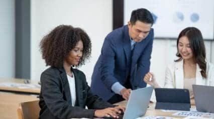 business team analyzes their strategy using the bcg matrix