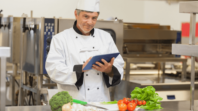 A staff member is answering a food traceability template.